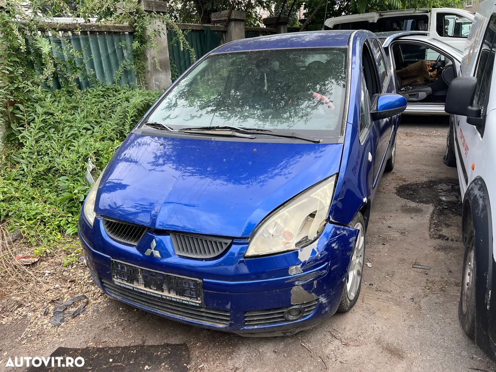 Dezmembrez Mitsubishi Colt 2006 albastru 1,1 1,3 benzina 2006 - 4