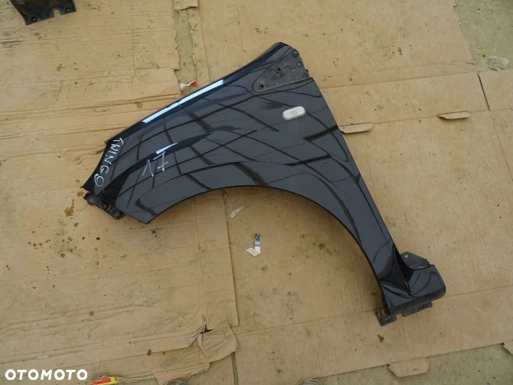 Błotnik Lewy Przód Renault Twingo II 3D 2009