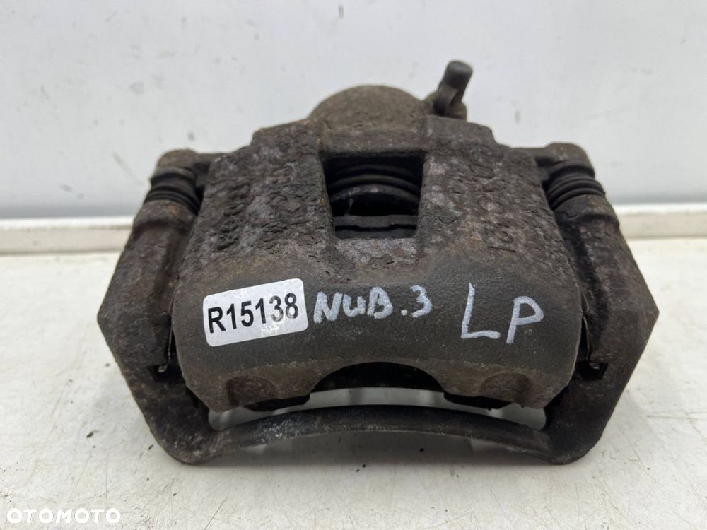 Zacisk hamulcowy Chevrolet Nubira III J200 05-12r. 2.0 cdi diesel lewy przedni jarzmo lewy przód - 1