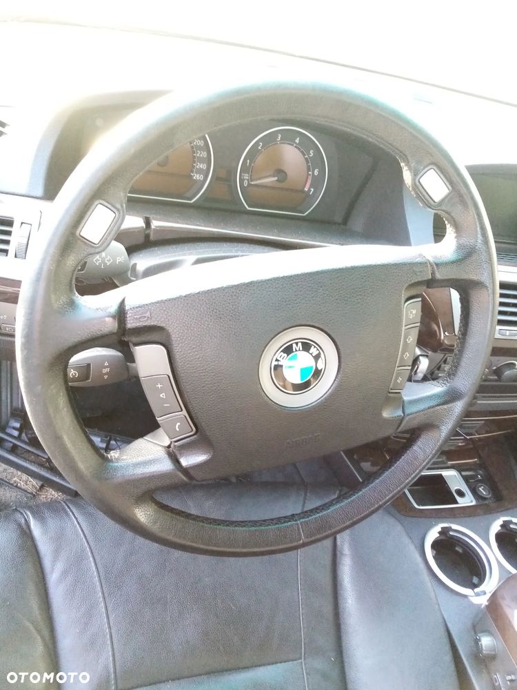 BMW E65 735i 3.6 N62B36A  01 - 05 - ZWROTNICA PRZÓD LEWA PRAWA - 19