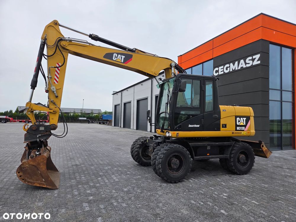 Caterpillar M313D / spr. ze Szwajcarii / - 1