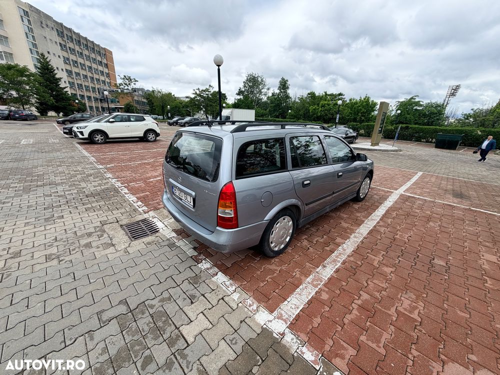 Opel Astra 1.6i Cosmo - 9