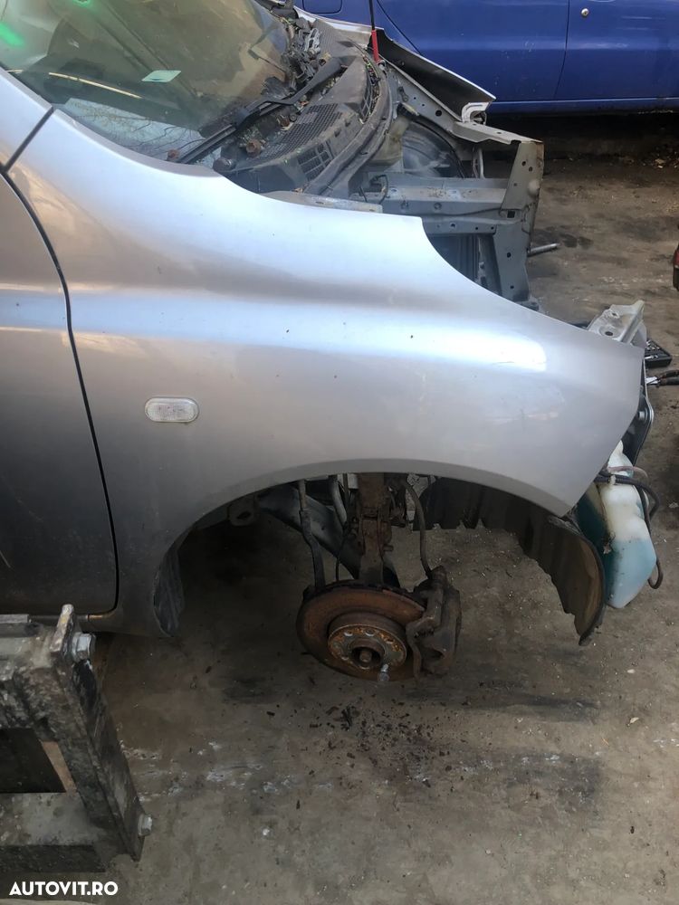 Aripa dreapta fata Nissan Micra 2005 gri argintiu - 6