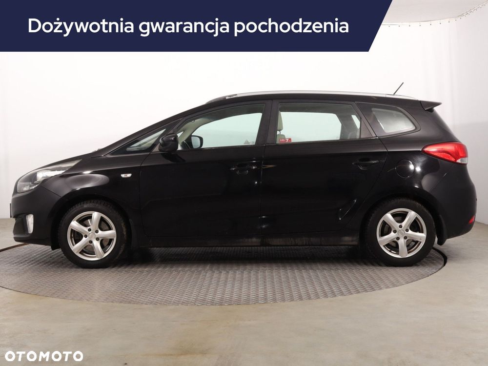 Kia Carens - 4