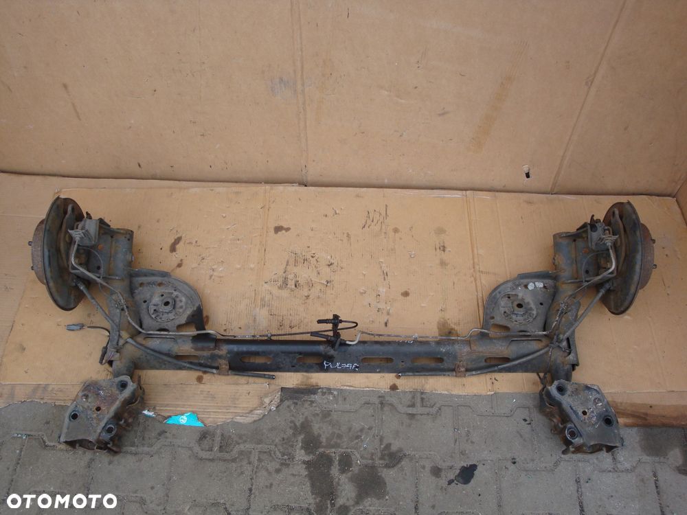 NISSAN PULSAR 14-18 BELKA ZAWIESZENIA TYLNEGO - 1