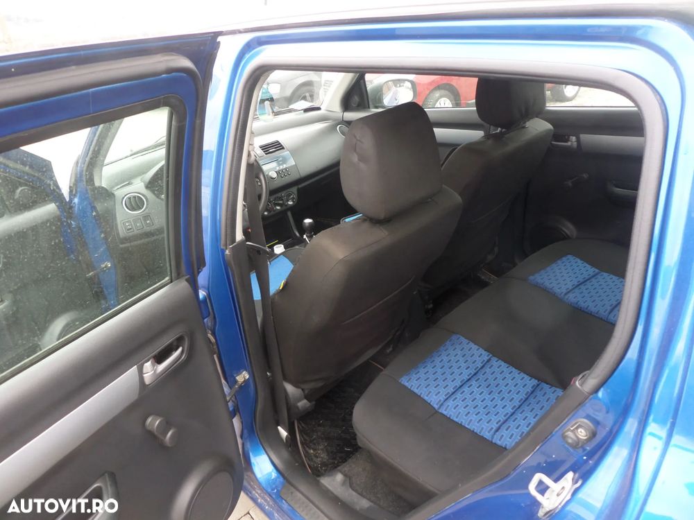 Suzuki Swift 1.3 Comfort - 12