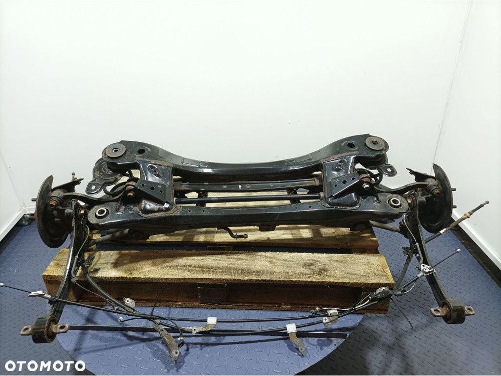 TOYOTA AURIS II LIFT KOMBI BELKA WÓZEK ZAWIESZENIA TYŁ - 4