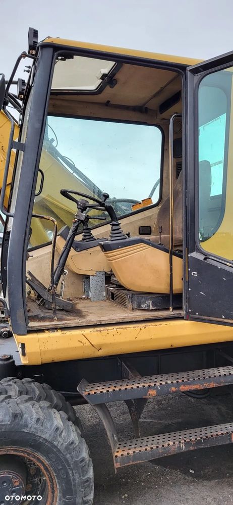 Caterpillar 315 - 12