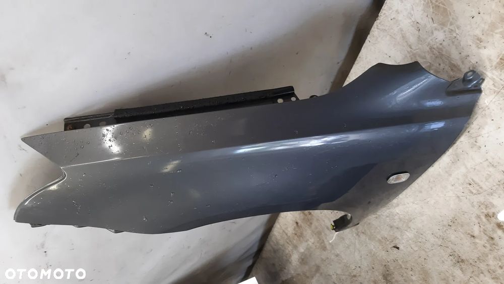 * BŁOTNIK PRZEDNI PRZÓD LEWY TOYOTA T25 1E5 SZARY - 2