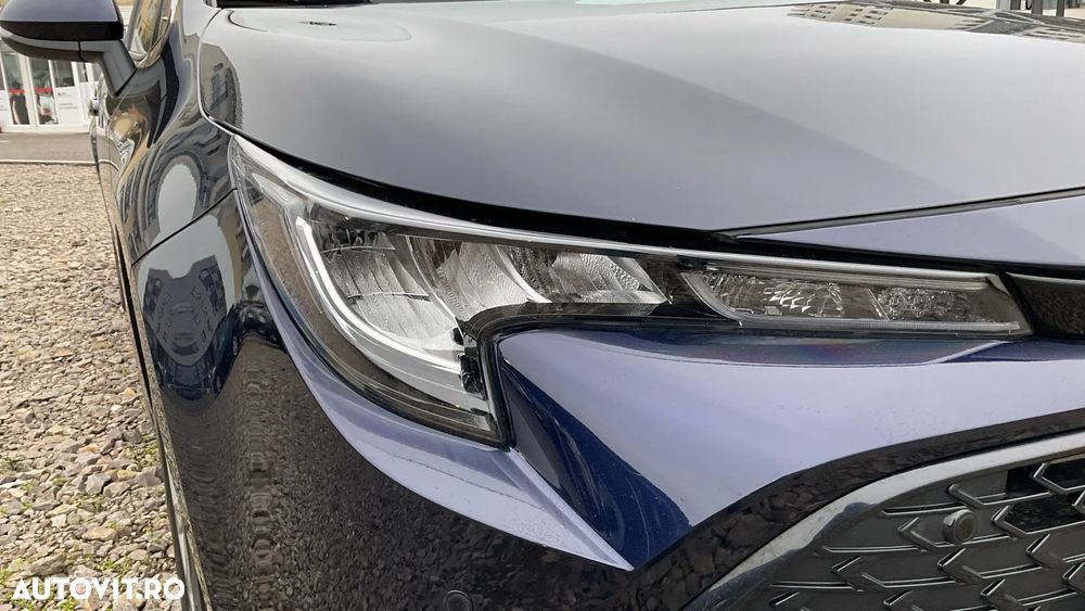 Toyota Corolla TS 1.8 HSD Dynamic - 11