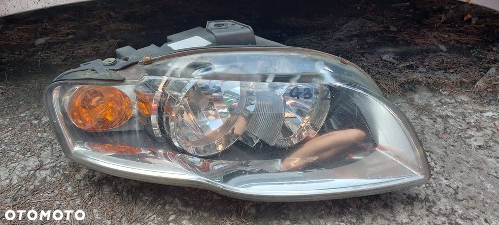 .  PRZOD PRZEDNIA LAMPA LEWA AUDI A4 B7 - 1