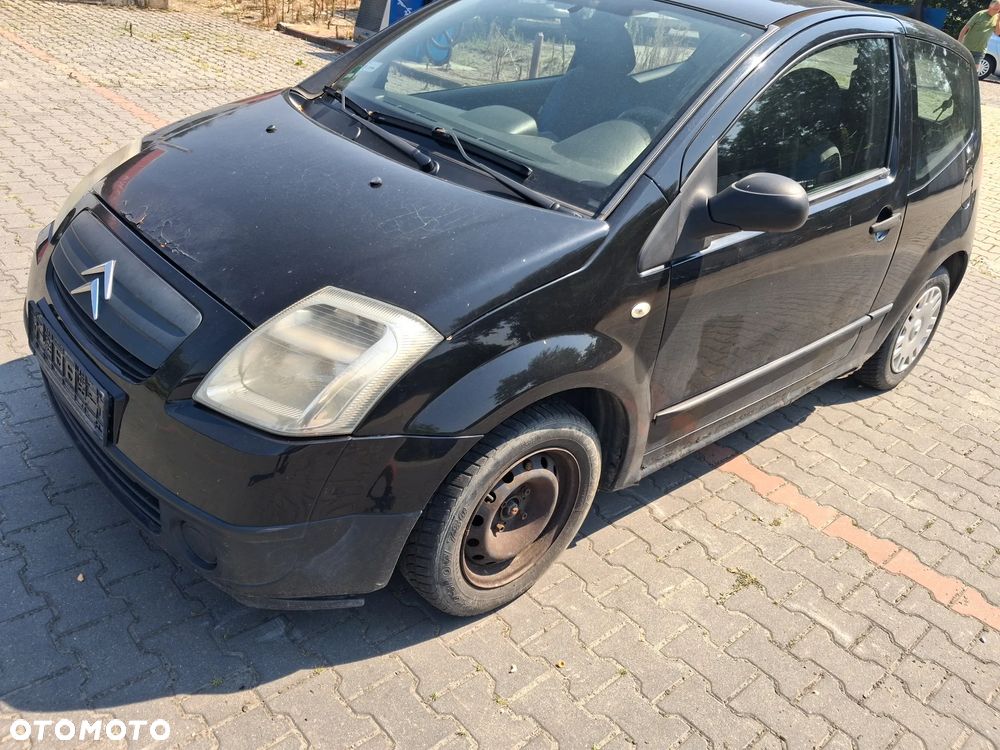 Citroen C2 silnik 1.1 60KM HFX skrzynia biegów sprzęgło drzwi klapa błotnik zderzak błotnik maska lusterko lakier EXYB czarny lewarek wybierak stacyjka sterownik moduł wiązka zbiorniczek alternator rozrusznik maglownica przepływomierz wąż przewód obudowa osłona atrapa podszybie mechanizm silniczek głośnik radio konsola wyświetlacz zegary moduł komfortu szyba mcperson amortyzator sprężyna sanki wahacz tłumik wydech kolektor zacisk hamulcowy pompa pompka ABS półoś podsufitka przysłonka lampa fotele panel sterowania klimatyzacji wykładzina kierownica manetki zwijak Air bag schowek konsola zamek klamka wspomaganie boczek pas przedni chłodnica NA CZĘŚCI wszystkie części - 2