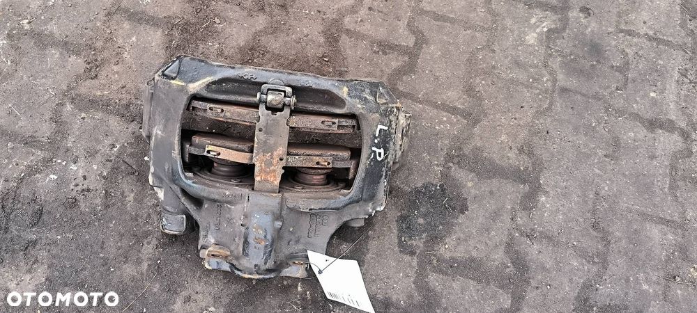 ZACISK HAMULCOWY PRZÓD LEWY MAN TGX 18.440 - 3