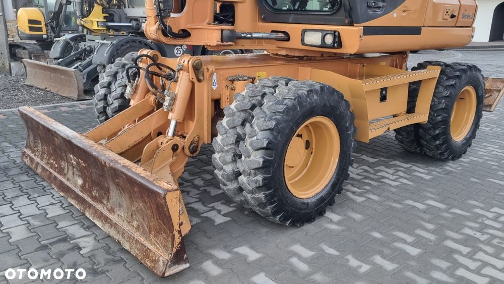 Case WX 125/ Łyżka skarpowa/ Maszyna sprowadzona/ - 17