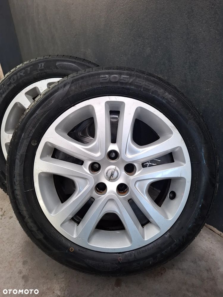 Felgi z kołpakami nowe opony Opel Astra K 5x105 - 3