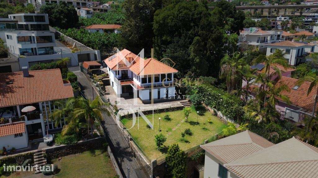 Moradia T3 transformada em T4 com vista privilegiada sobre o Funchal - Grande imagem: 2/48