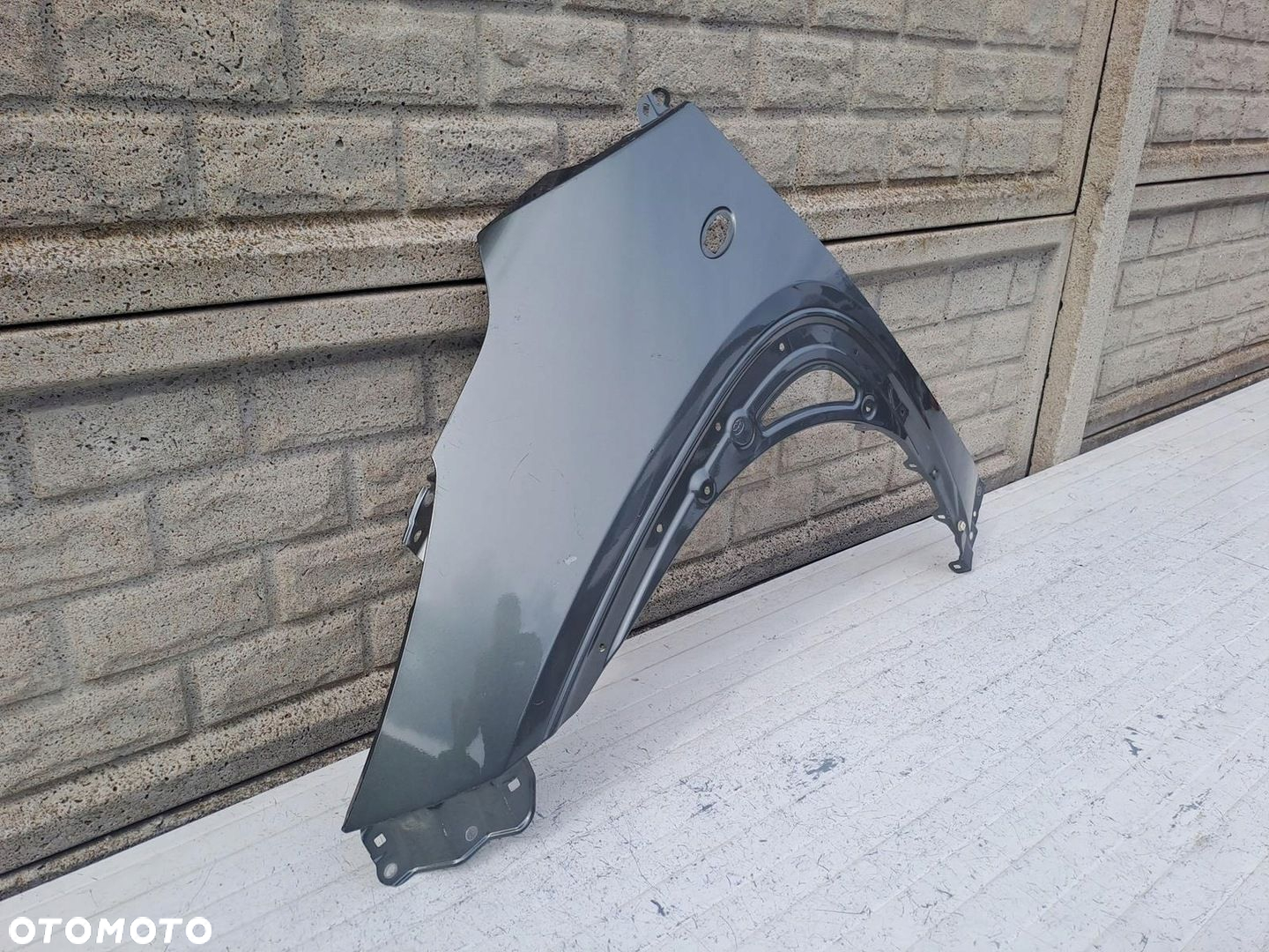 BŁOTNIK LEWY PRZÓD TOYOTA AYGO X 22-24 - 2