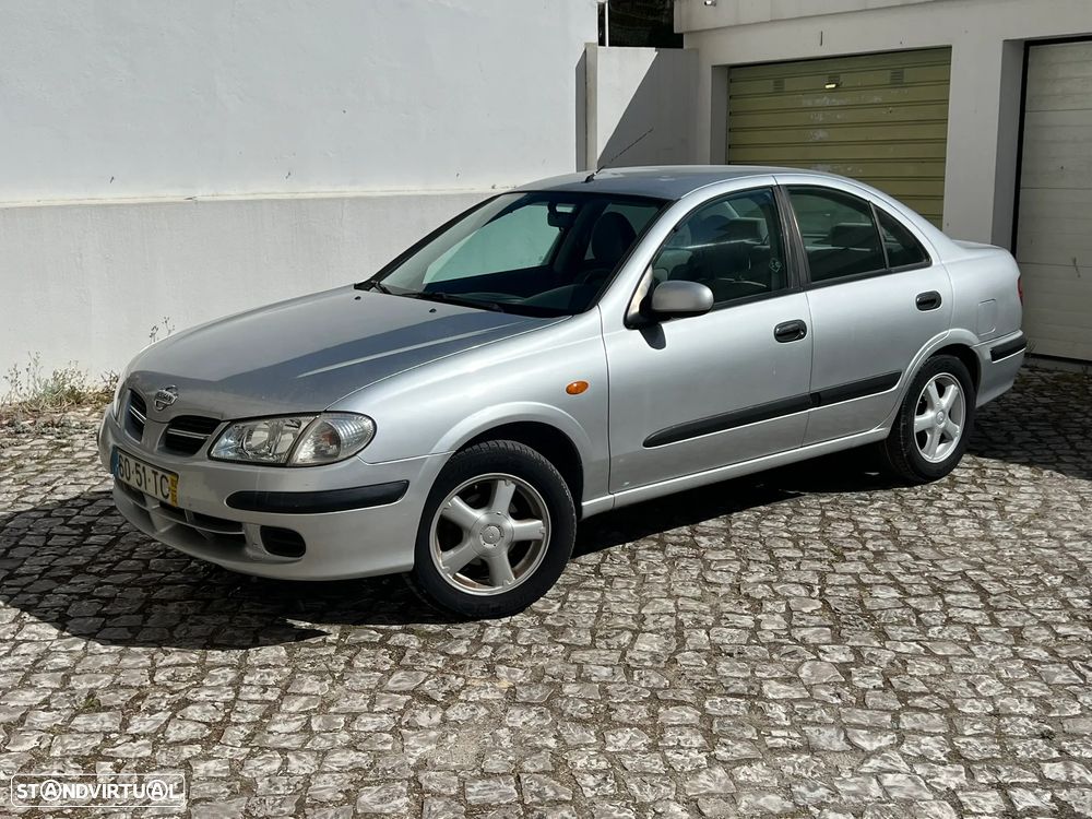 Nissan Almera 1.5 Comfort ABS+AC - 1