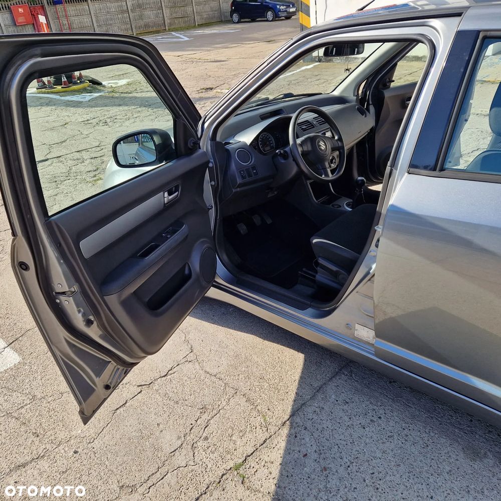 Suzuki Swift 1.3 Club - 13