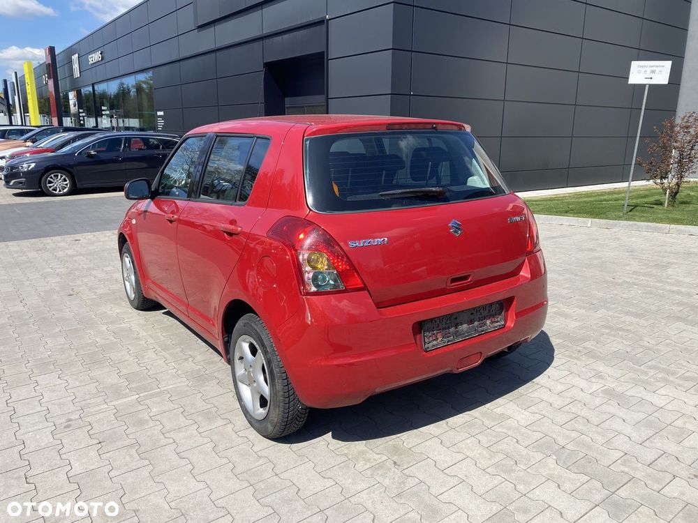 Suzuki Swift 1.3 Club - 11