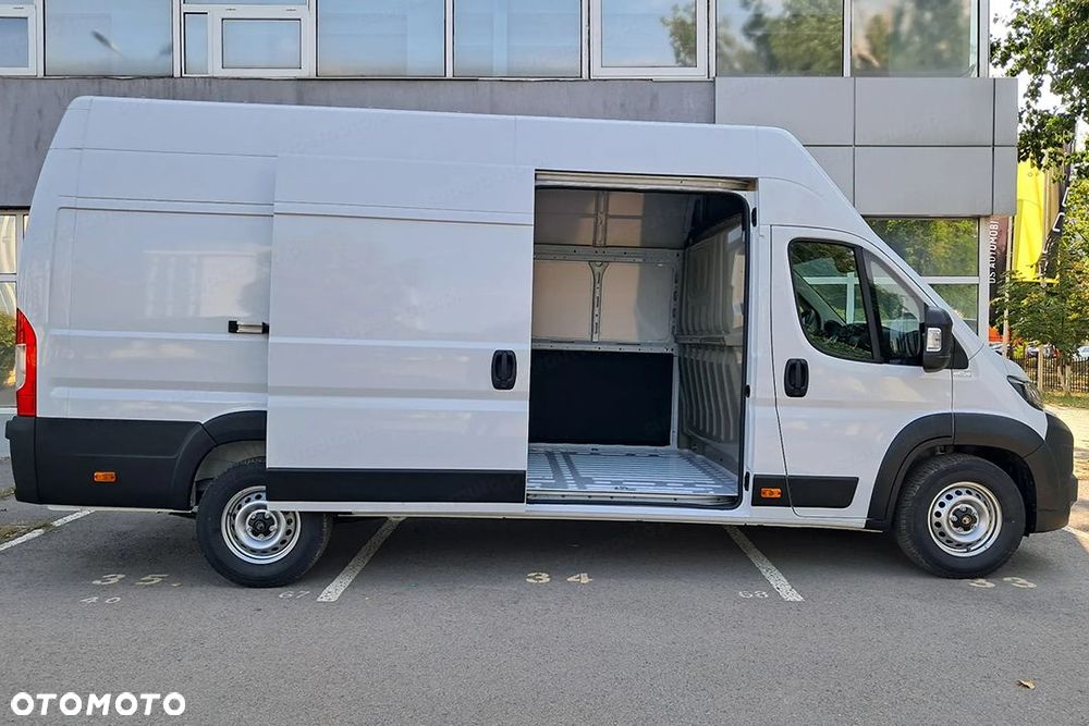 Opel Movano Heavy L4H3 2.2 140KM - 11
