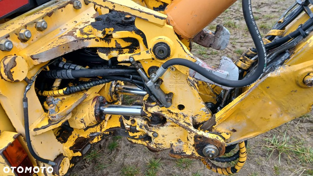 New Holland LB 115 - 29