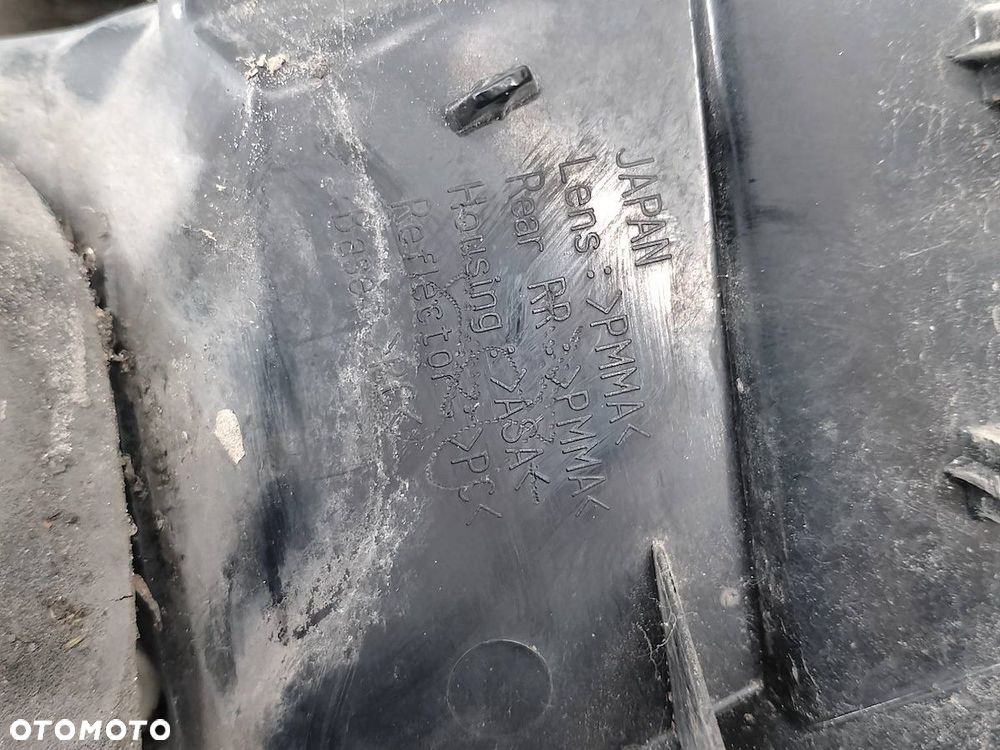 LAMPA TYLNA LEWA MITSUBISHI GRANDIS - 2