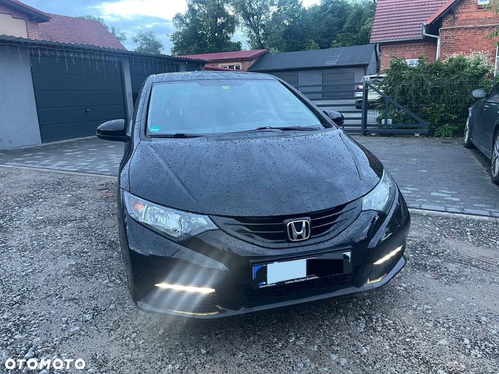 Honda Civic 1.4 i-VTEC Comfort - 1
