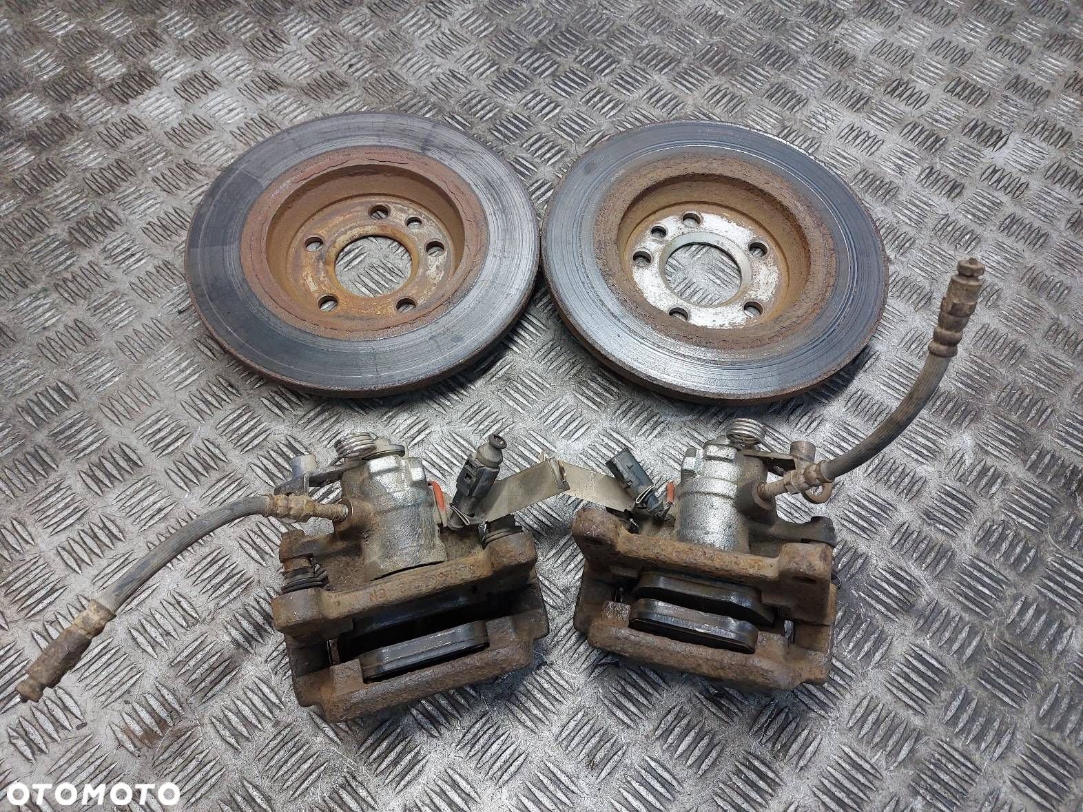 TARCZE HAMULCOWE TYŁ + KLOCKI + ZACISKI FORD GALAXY MK1 LIFT 2.8 VR6 - 2