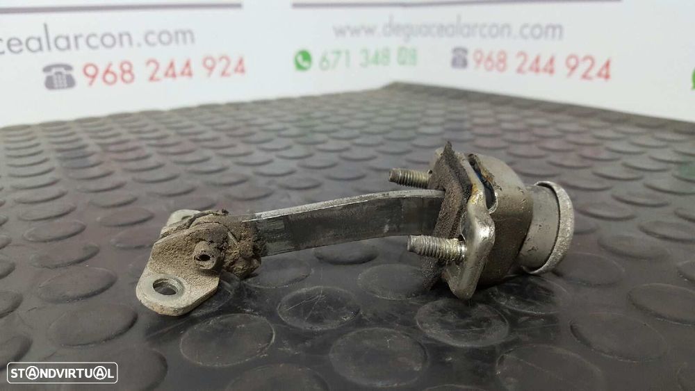 RETENTOR DA PORTA DIANTEIRA ESQUERDA CITROEN ZX 1.6 ARMONIA - 2