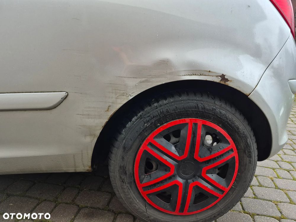 Opel Corsa 1.2 16V Enjoy - 13