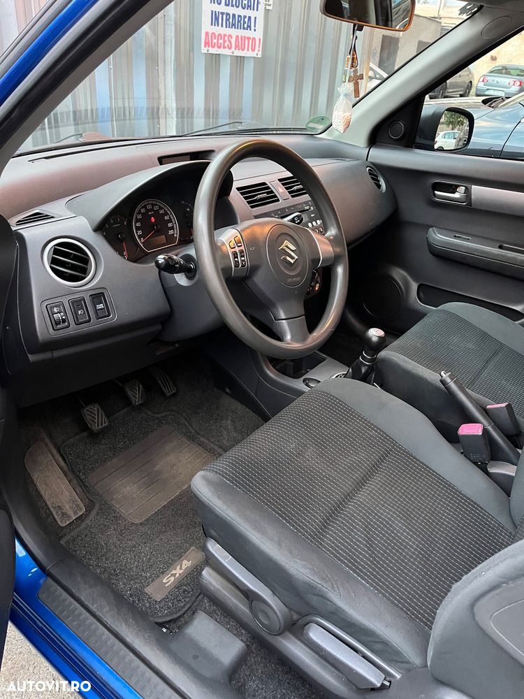 Suzuki Swift 1.3 GLX - 8