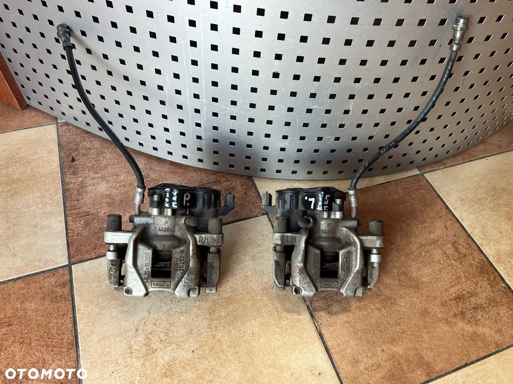 ZACISK HAMULCOWY ELEKTRYCZNY TYŁ TYLNY PRAWY LEWY FORD FOCUS MK4 KOMBI ST LINE 1.0 ECOBOOST 2020 ROK 15.000km SUPER STAN LX61-2D250-BEC  LX61-2D251-BEC - 1