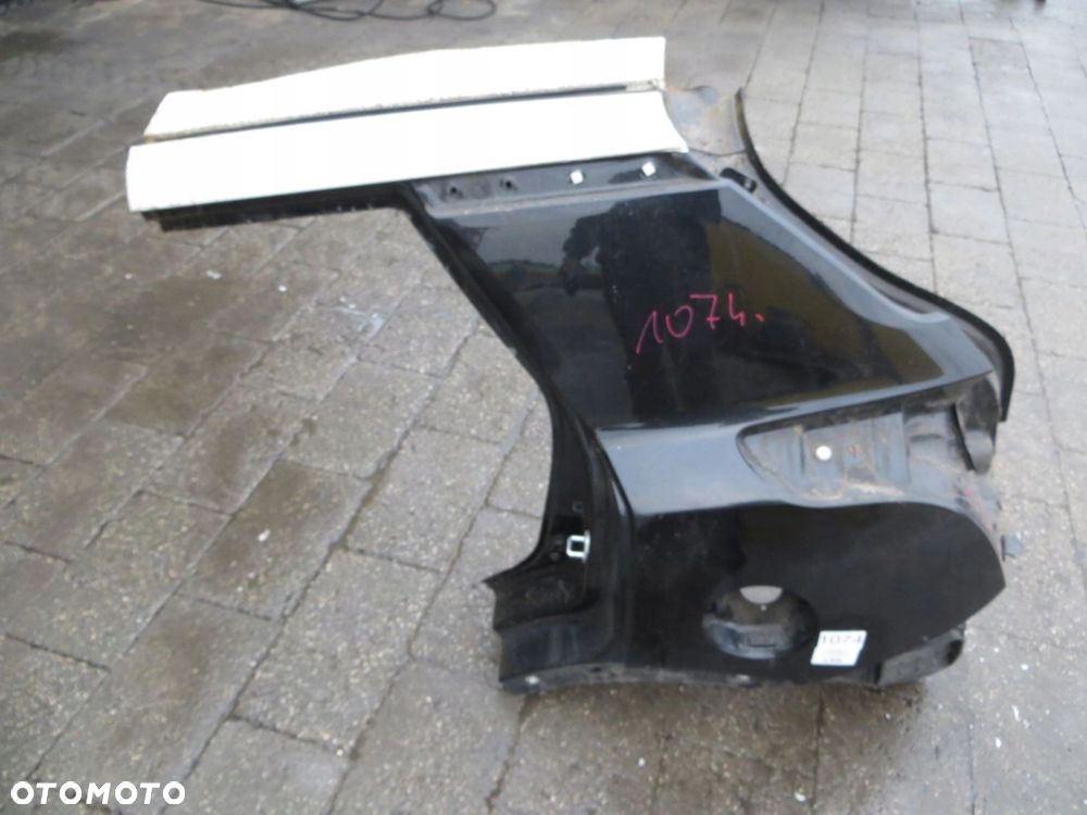 SSANGYONG TIVOLI BŁOTNIK LEWY TYŁ TYLNY LAK 14- - 1