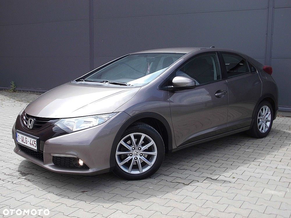 Honda Civic 1.4 i-VTEC Elegance - 1