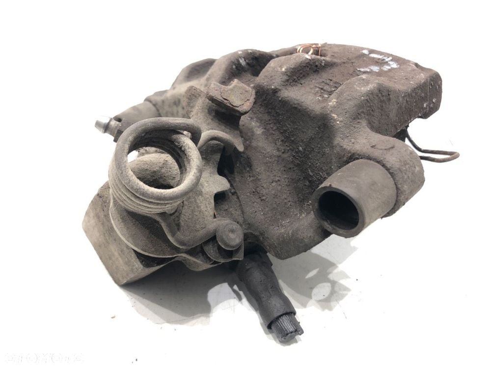 ZACISK LEWY TYŁ  VOLVO C30 (533) 2006 - 2013 1.6 D2 84 kW [115 KM] olej napędowy 2010 - 2012 - 2