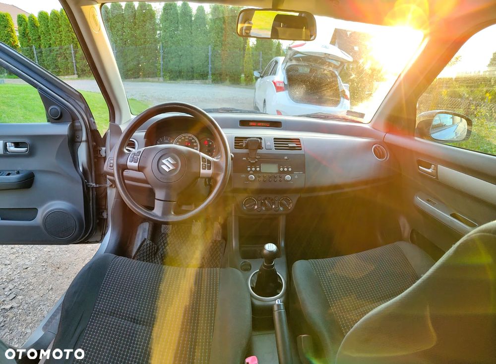 Suzuki Swift 1.3 GLX / Comfort - 11