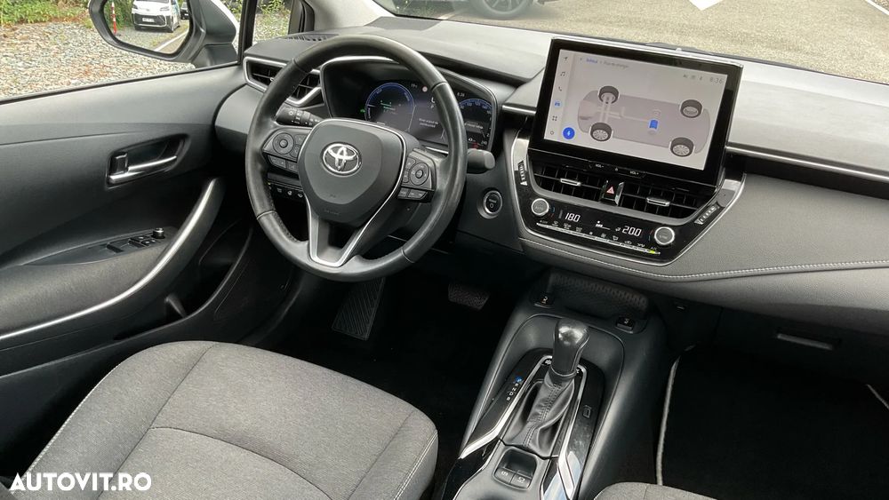 Toyota Corolla 1.8 HSD Business - 32