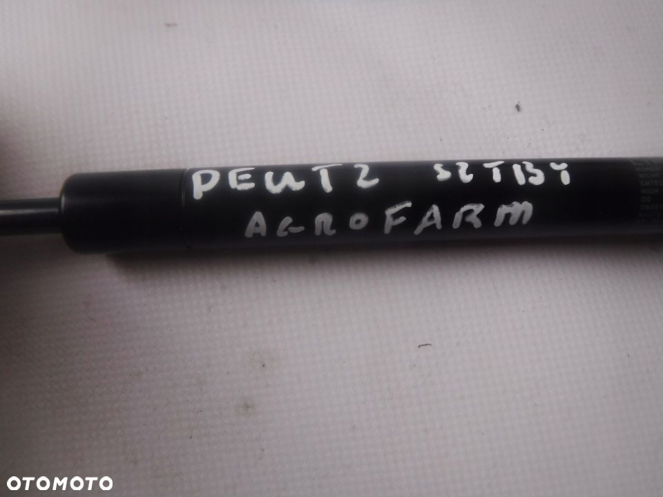DEUTZ AGROFARM SIŁOWNIK SZYBY L585 CA083895 - 2