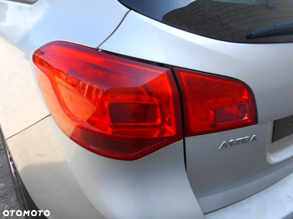OPEL ASTRA J SPORT TOURER KOMBI KOD LAKIERU Z176 92KW-125KM  SILNIK SKRZYNIA BIEGOW MANUALNA 6 BIEGOWA MASKA LAMPA LUSTERKO PAS PRZEDNI BLOTNIK ZAWIESZENIE  ZDERZAK PRZOD SPRYSK SPRISKIWACZ LAMP SOCZEWKA CZESCI - 15