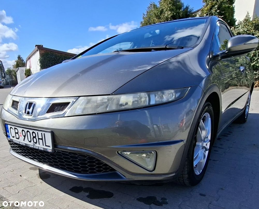 Honda Civic 1.4i-DSi Comfort - 1