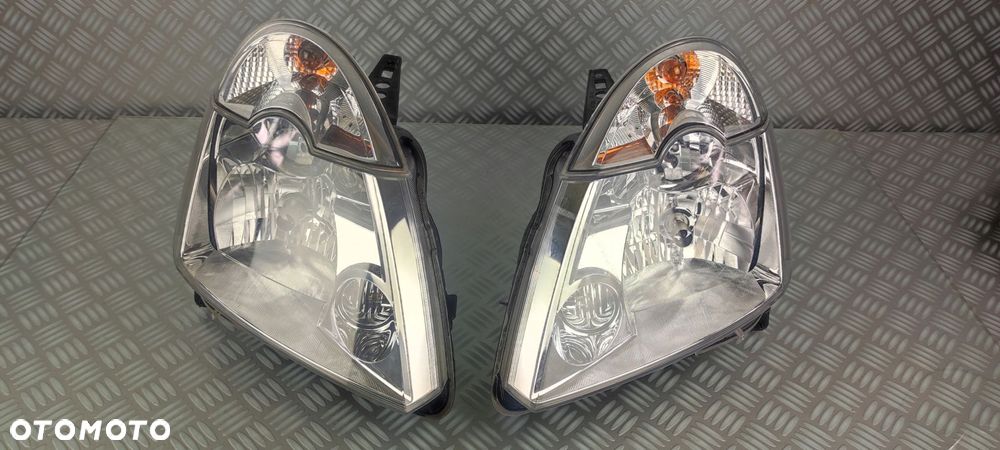 reflektor lampa prawy prawa lewa lewy przód przednia RENAULT MODUS I EUROPA - 2