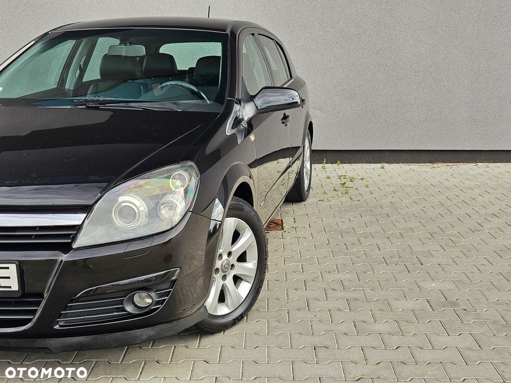 Opel Astra 1.8 Cosmo - 11