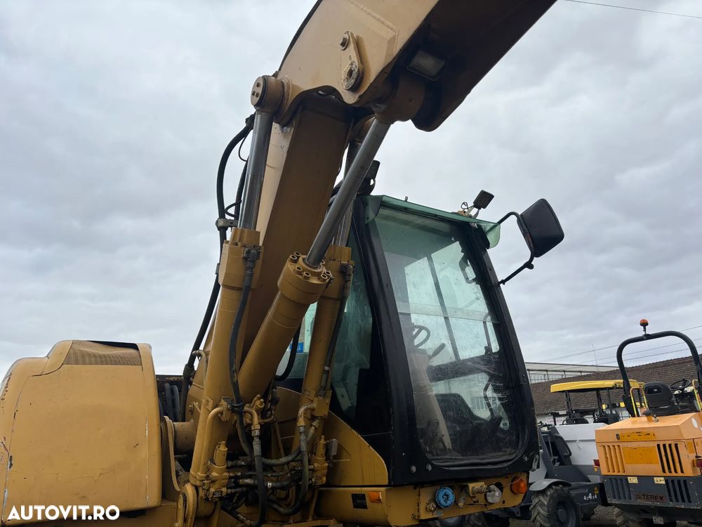 Caterpillar M316C - 13