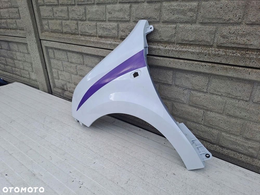 BŁOTNIK LEWY RENAULT TWINGO 3 III 2014 - 2022 - 2