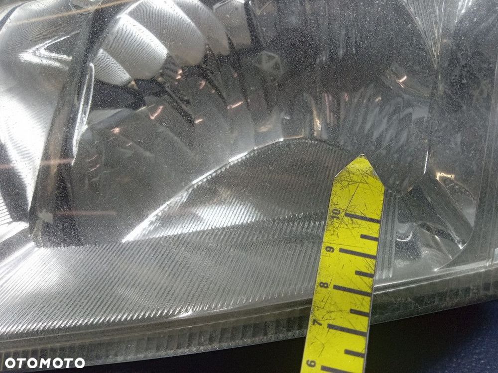 OPEL MERIVA A REFLEKTOR LEWY LAMPA EU 93321052 - 9