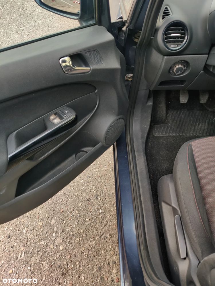 Opel Corsa 1.2 16V Enjoy - 11