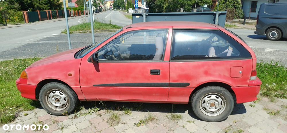 Suzuki Swift 1.0 GLS - 1