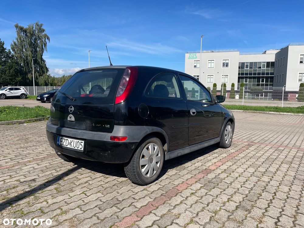 Opel Corsa 1.2 16V Comfort - 6