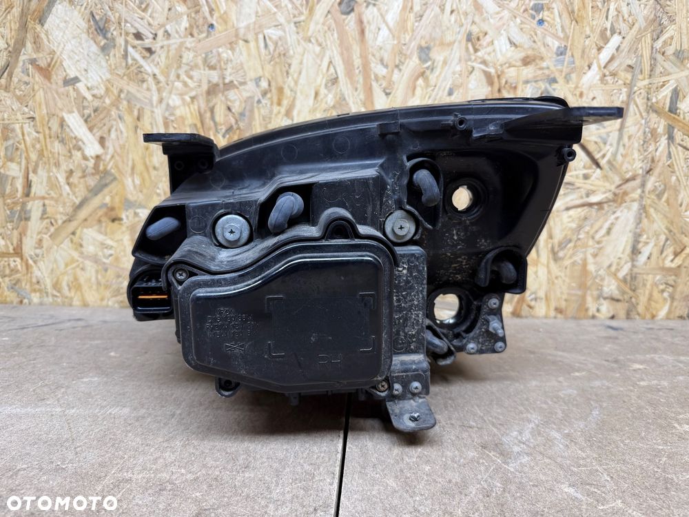 LAMPA PRAWA XENON OPEL ANTARA LIFT - 7